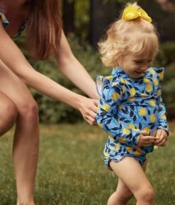 The Girls' Ruffle Rash Guard Tankini Set - Nectarine Orchard