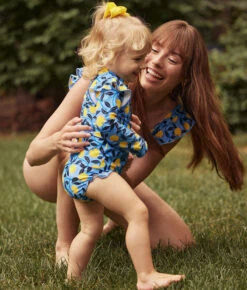 The Girls' Ruffle Rash Guard Tankini Set - Nectarine Orchard -Cheap Sunset Bikini Store 3 ModelFullBody 86b599f5 17ff 4ed8 9c39 b7f28ec22487