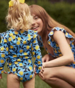 The Girls' Ruffle Rash Guard Tankini Set - Nectarine Orchard -Cheap Sunset Bikini Store 4 ModelDetail 82eb6907 3974 4be9 93da 98d266fdb3a4