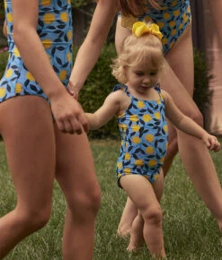 The Girl’s Ruffle One Piece - Nectarine Orchard -Cheap Sunset Bikini Store 5 ExtraProductShot 6e9e8d5c ede7 4f92 b2c3 a27cdcf01184