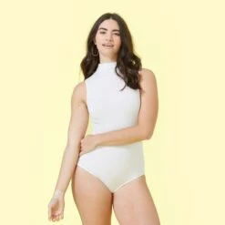 The Sleeveless Day To Night Bodysuit - White Sand